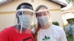 Paige Balcom and Peter Okwoko wearing face shields.