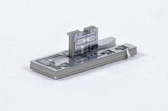 A ZIF (zero insertion force) socket micro robot, which provides a simple approach to integrating CMOS chips and MEMS structures.