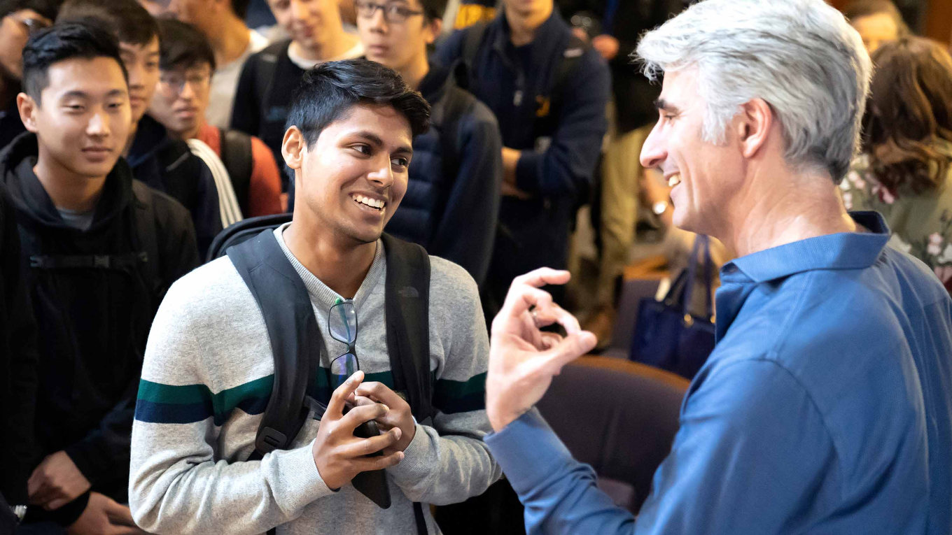 Craig Federighi, senior VP of Apple, speaks with students after a View from the Top lecture