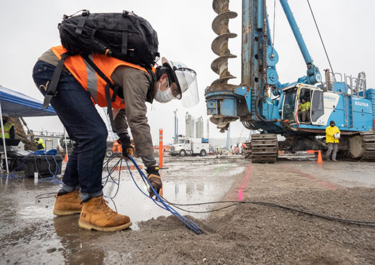 Testing distributed fiber optic sensing (DFOS) technology at a construction site in San Francisco.