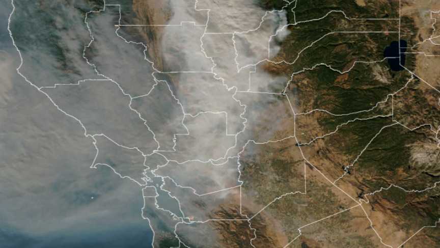 Aerial photo of smoke from wildfires, with California county map superimposed