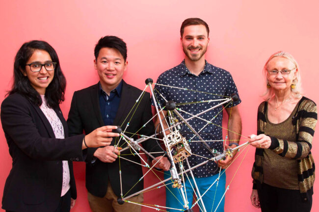 Fung Center students and faculty with tensegrity robot