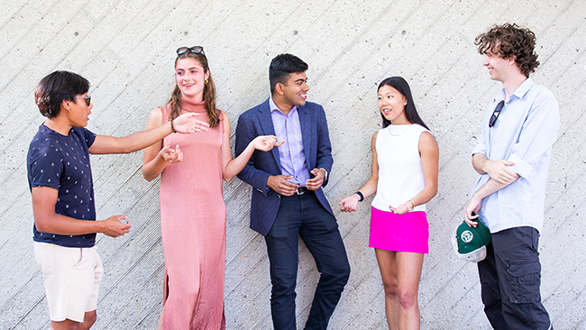 five MEng students chatting outside of Mudd Hall in Berkeley, CA