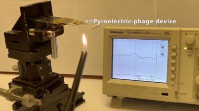 Photograph showing the electric potential generated from virus film upon heating.